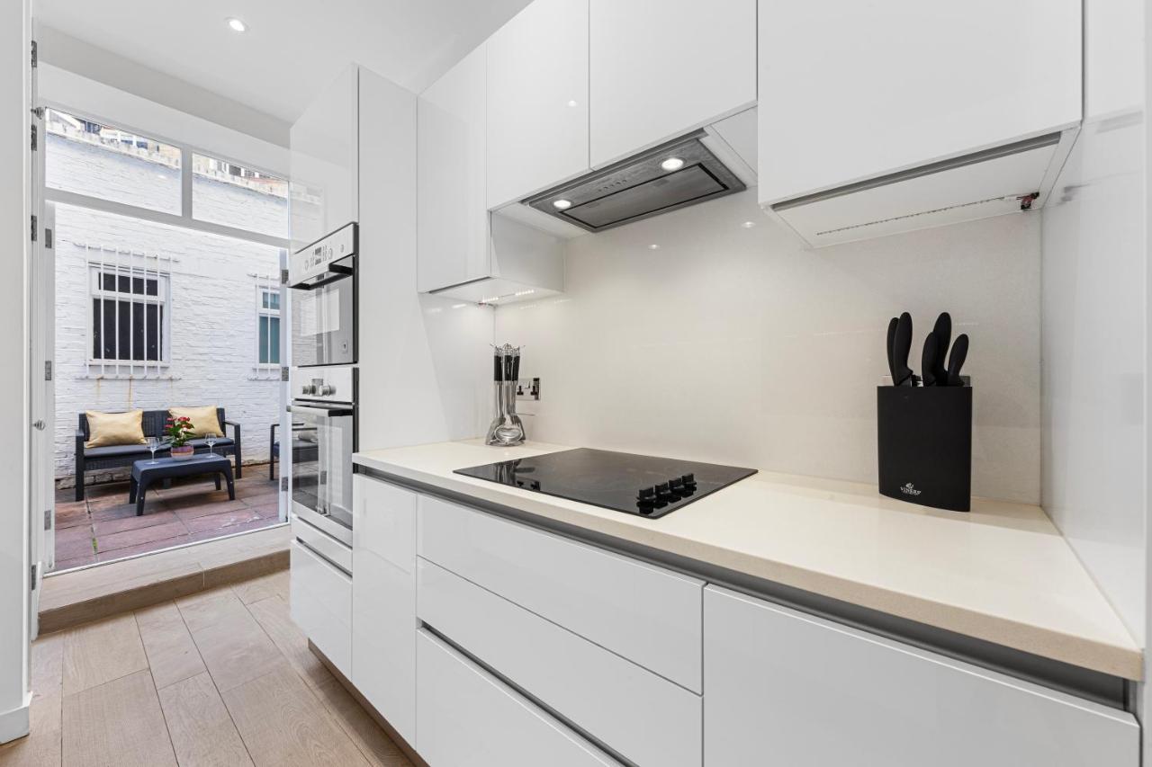 Apartamento Harrods 2 Bed Lux Flat W/Patio Londres Exterior foto