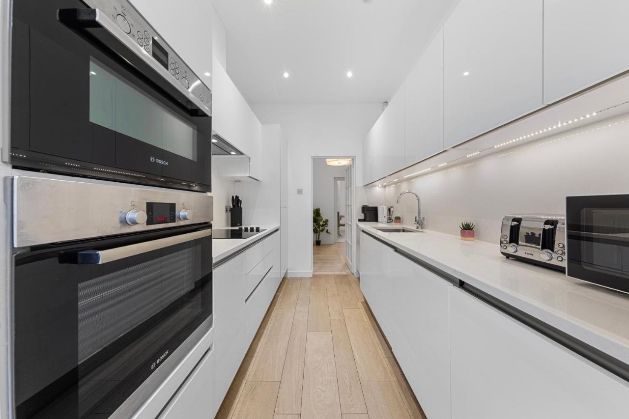 Apartamento Harrods 2 Bed Lux Flat W/Patio Londres Exterior foto