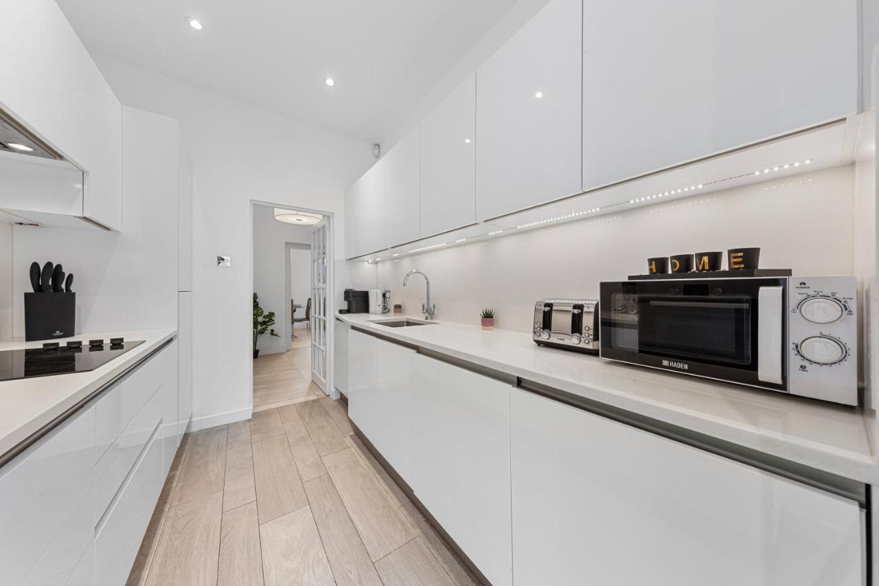 Apartamento Harrods 2 Bed Lux Flat W/Patio Londres Exterior foto